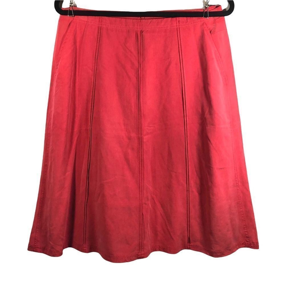 Trousers etc. brand muted coral 100% silk skirt.